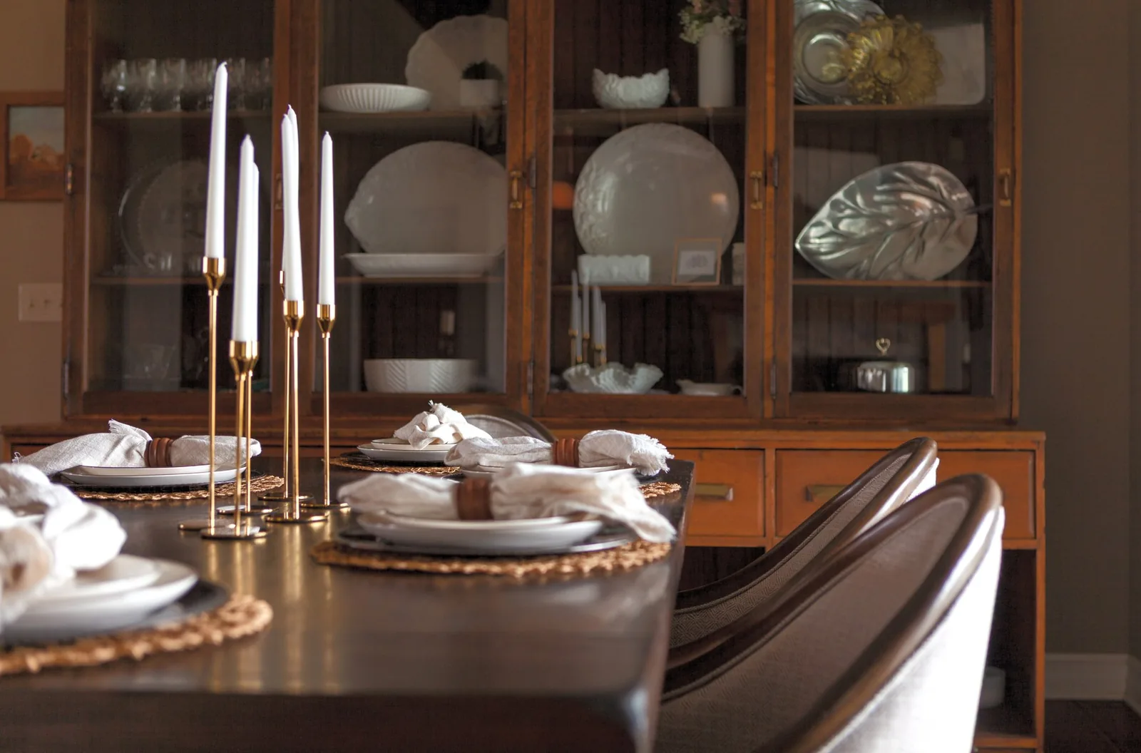Warm, elevated dining room styled by Willow & Stone Interiors in Omaha
