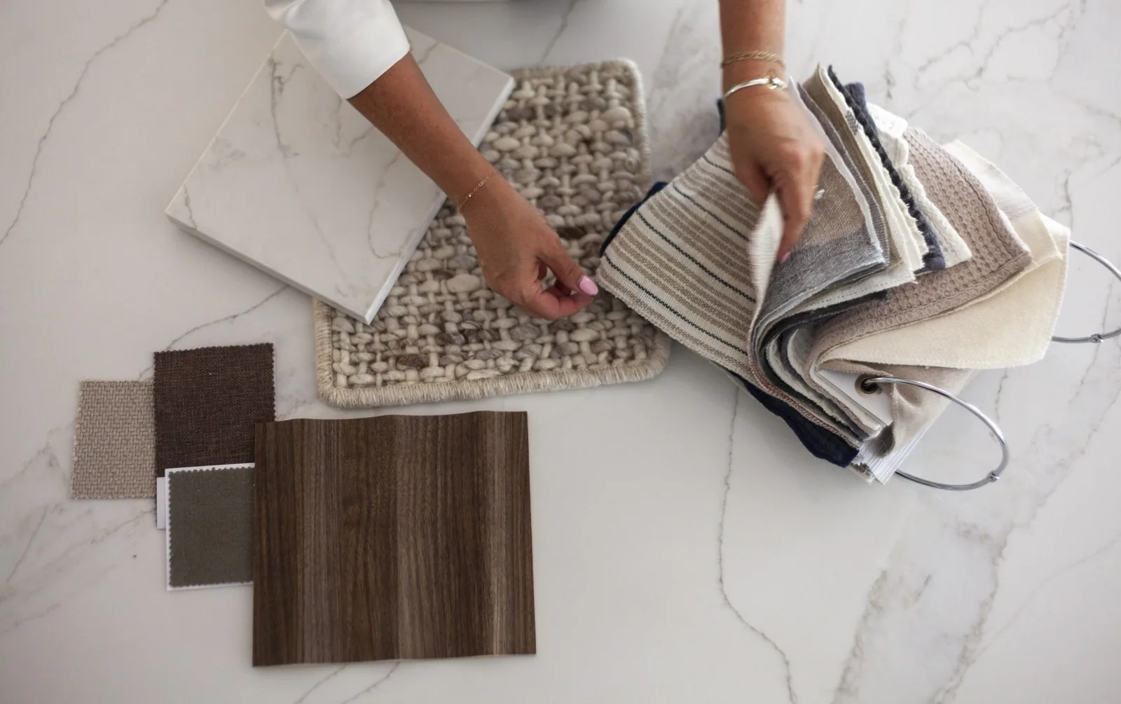 Curated material, fabric, and finish selections for an Omaha interior design project